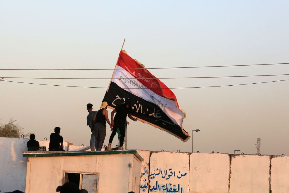 Supporters storm Republican Palace after Iraqi Shiite cleric Moqtada al-Sadr announced retirement from politics  / AHMED JALIL